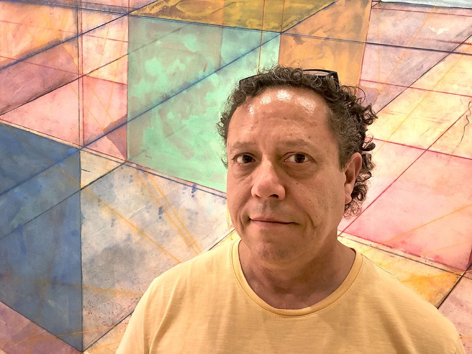 portrait of man with geometric background
