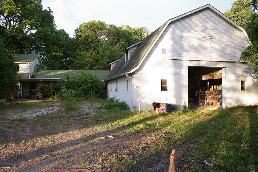 outside shot of old barn and connected pool house