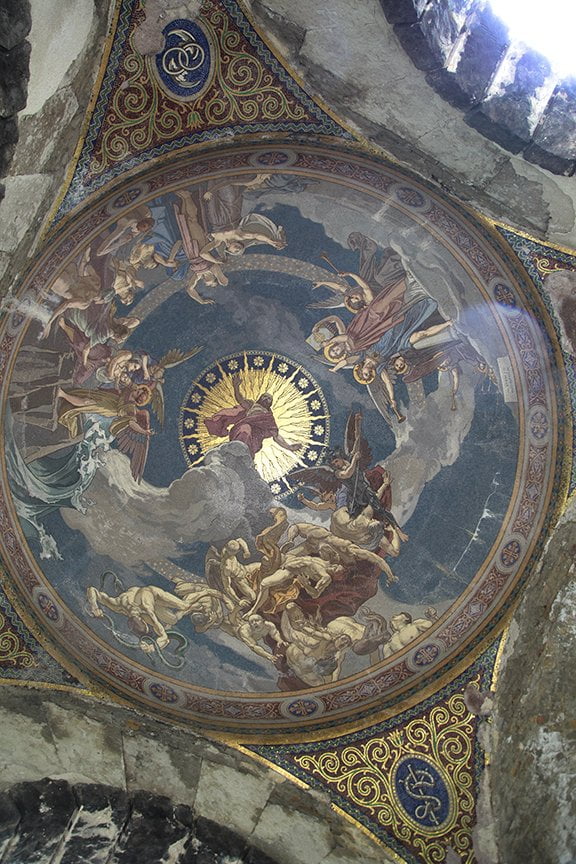 ornate ceiling detail with mythological characters in mausoleum