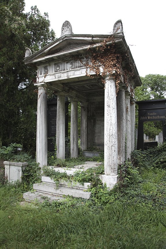 miniature Greek temple tomb also overgrown