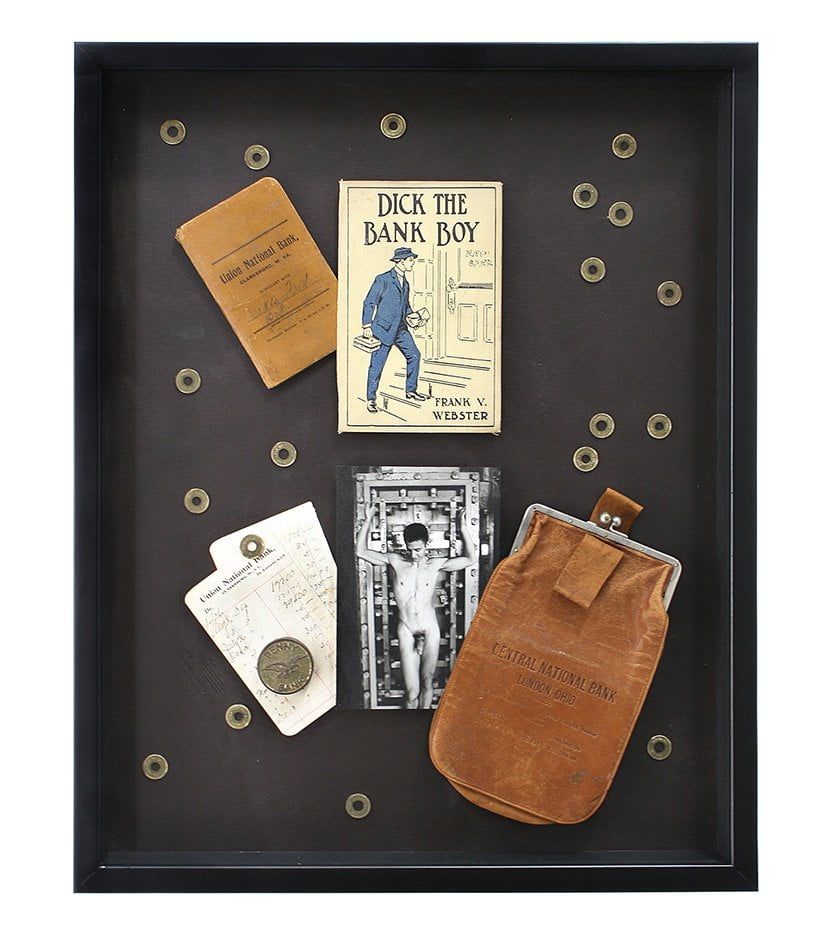 shadow box with image of man with descriptive ephemera