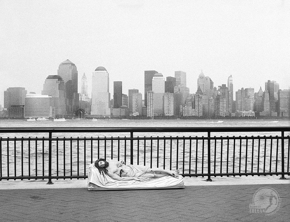 statue of Jesus in New Jersey looking toward the World Trade Center