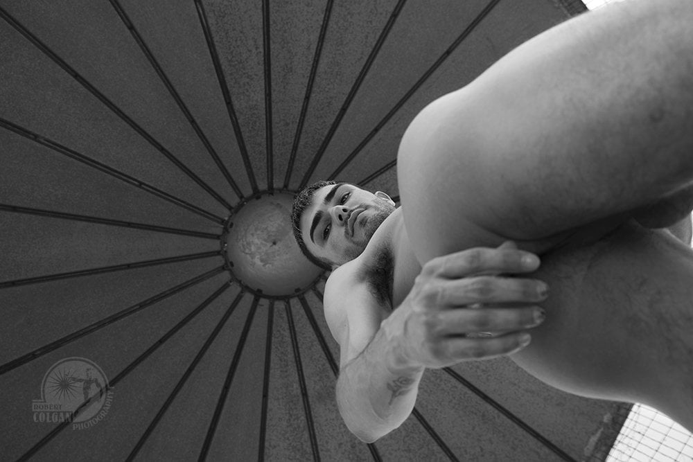 looking up at nude man in silo