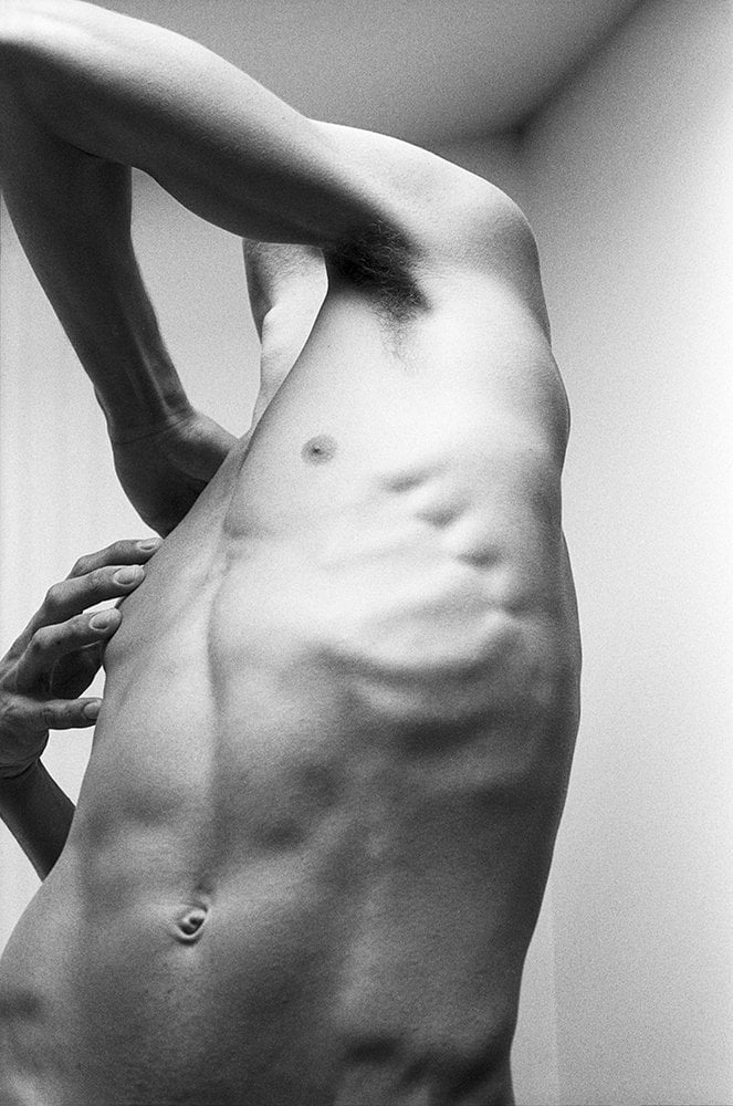 nude man stretching