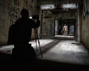 Me photographing a nude model in an old factory